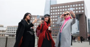 Modern American fashion styles for 2026 showcasing sustainable fabrics, smart clothing, bold colors, and inclusive designs